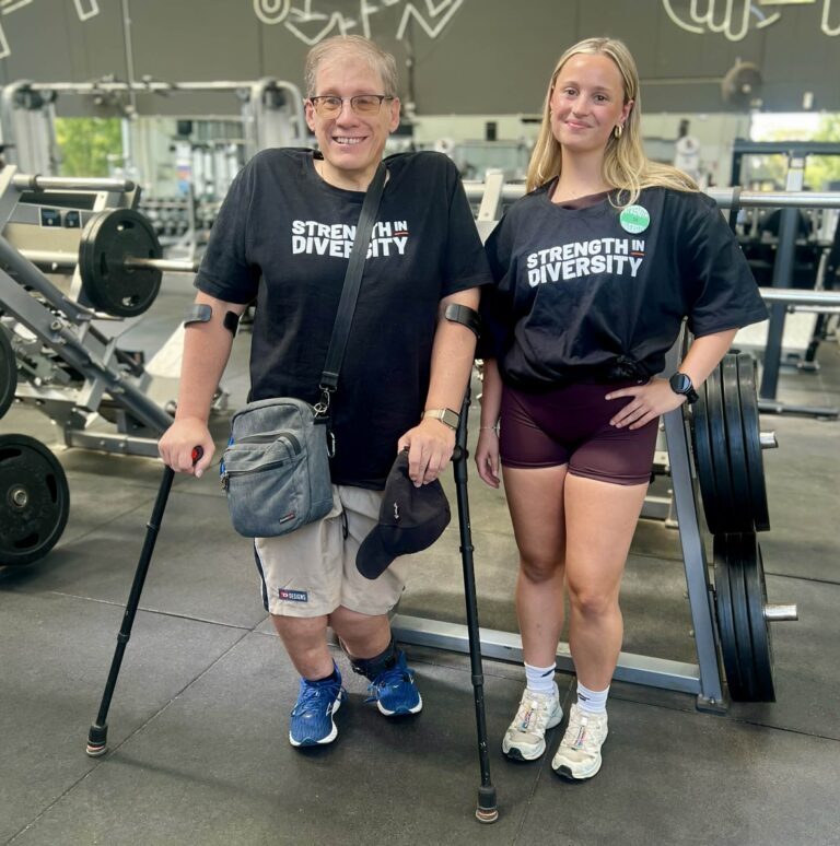Andy with Snap Fitness gym trainer Lucy.