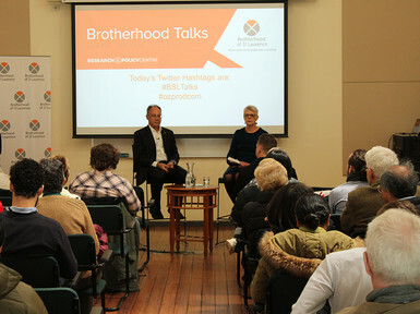 Audience and presenters at Brotherhood Talks