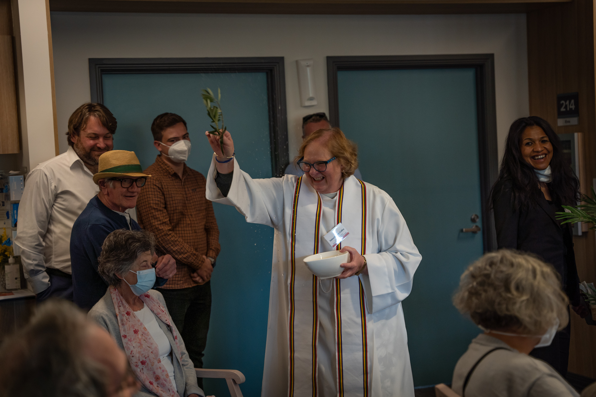 BSL Chaplain Debra Saffrey-Collins performs a blessing for staff and residents
