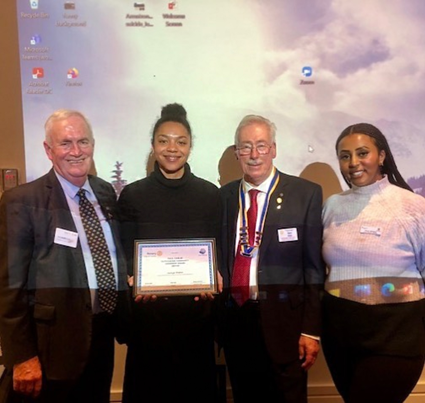 Pictured from left to right – Rotary Club of Carlton immediate Past President, Keith Ryall; BSL volunteer, Jazmyn Walkin; President, Ian Ada; BSL Community Engagement Co-Ordinator, Hiwot Birahane