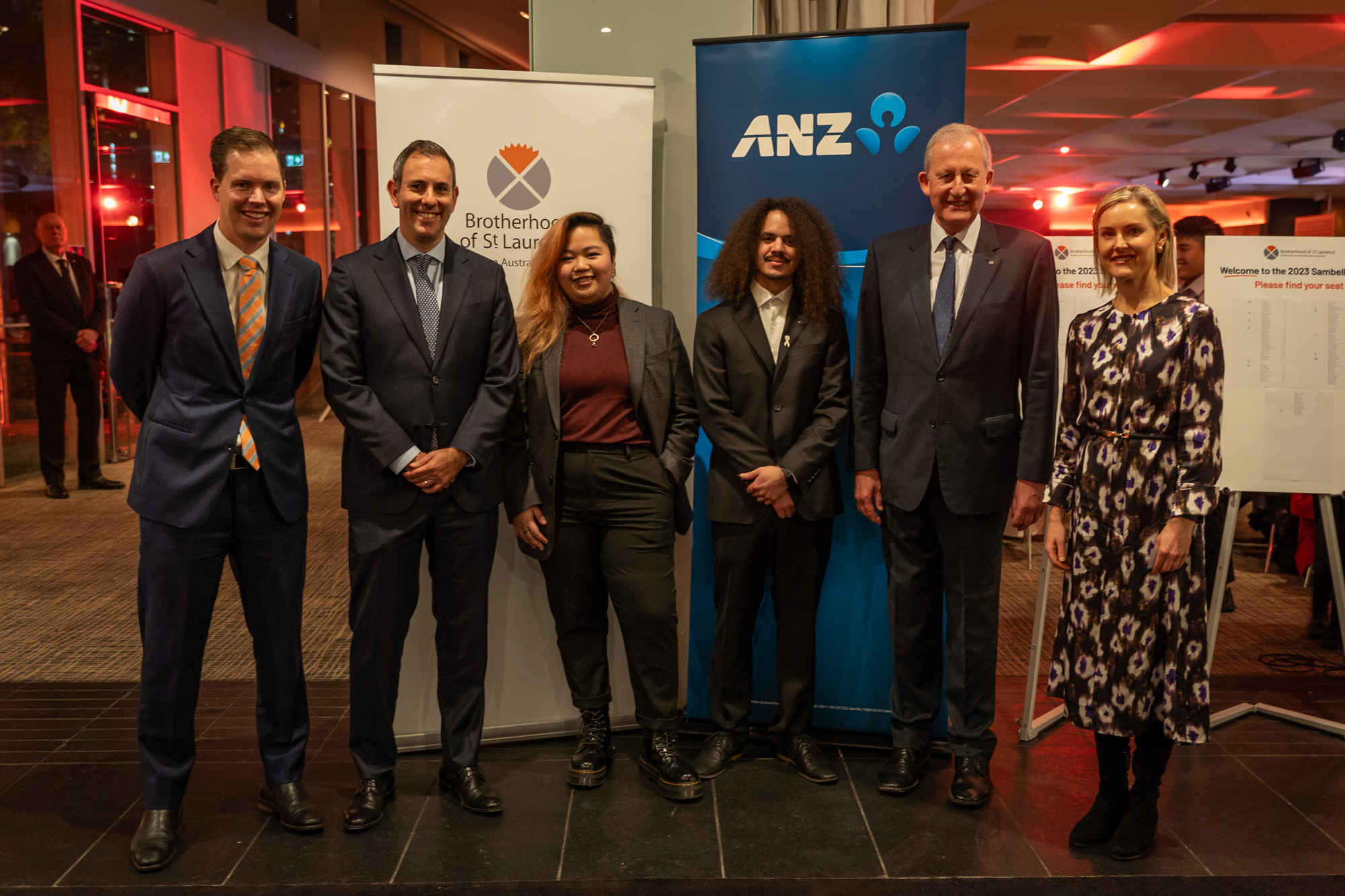 From left: BSL Executive Director Trav Mcleod, Treasurer the Hon Jim Chalmers MP, Board Chair Stephen Newton and Clare Morgan, ANZ’s Group Executive Australia Commercial. They arestanding in front of the BSL and ANZ banners smiling at the camera
