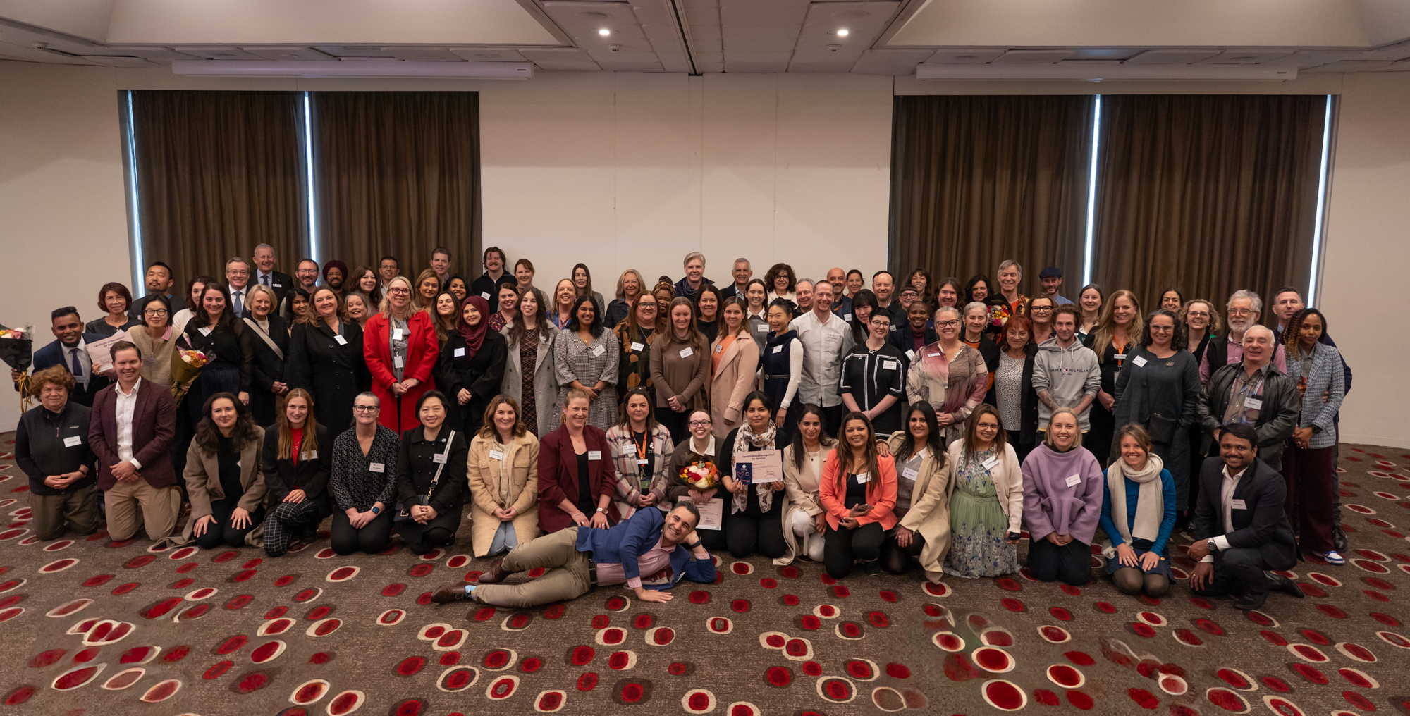 Whole BSL staff and volunteers celebrating their collective achievements.