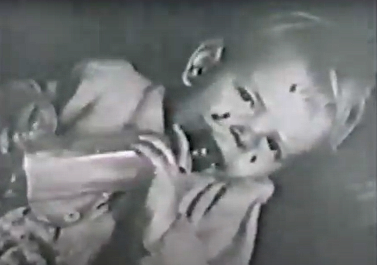 This still from Tucker’s 1947 film ’Beautiful Melbourne’ shows a toddler crawling with house lice. The film was made to illustrate the poor living conditions that many families in Melbourne were still experiencing eight years after the Housing Commission of Victoria was established in 1938 to address inner suburban housing.