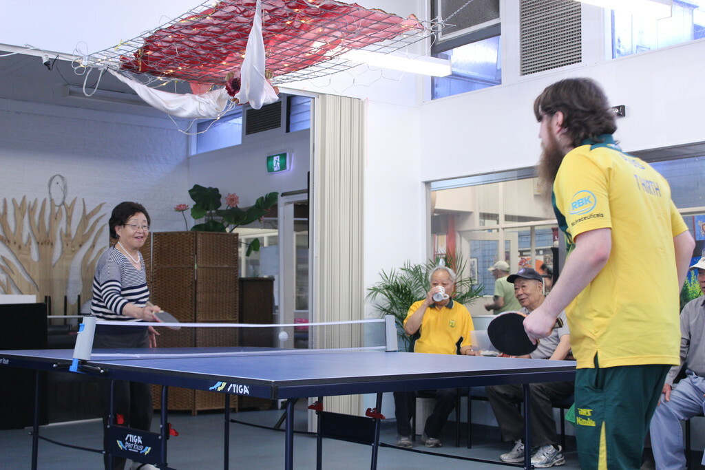 Staff table tennis match at the Coolibah Centre