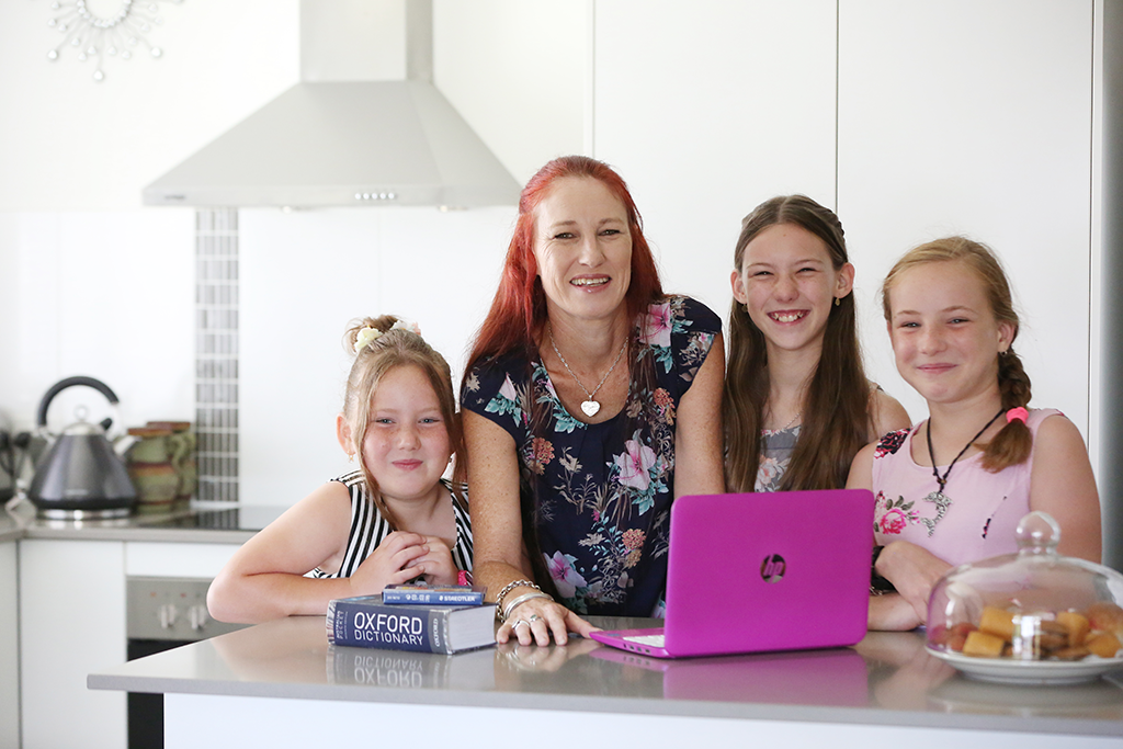 Saver Plus participant, Paula, with her three daughters