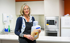 Breakfast Club volunteer, Sally, in the kitchen
