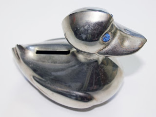 Duck shaped antique money bank