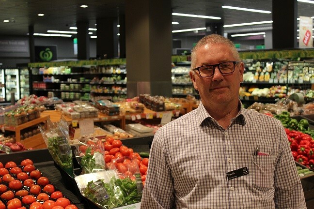 Man standing in Woolworths