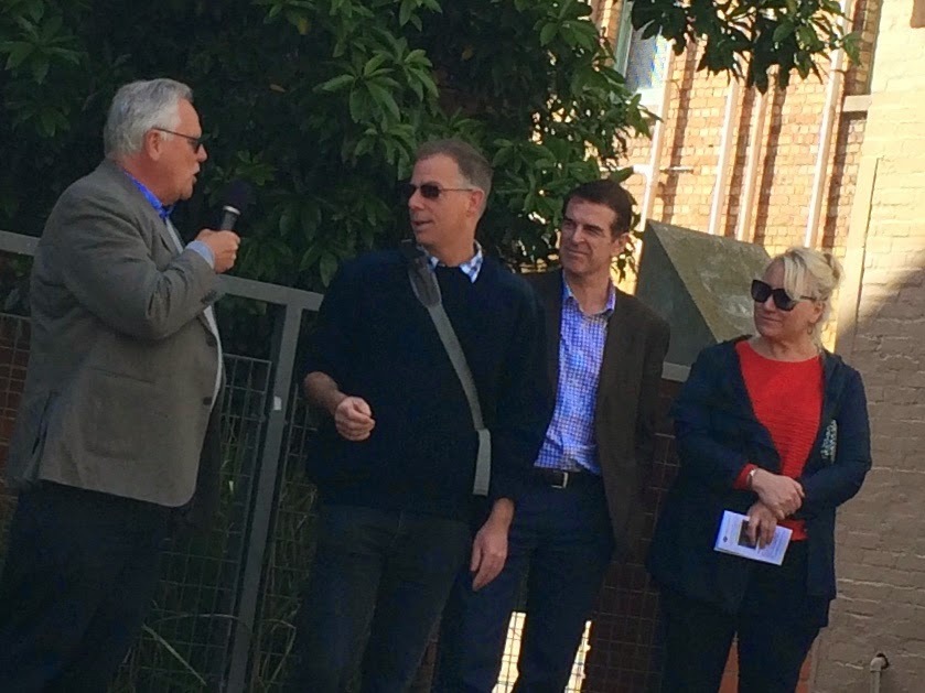 Four people presenting