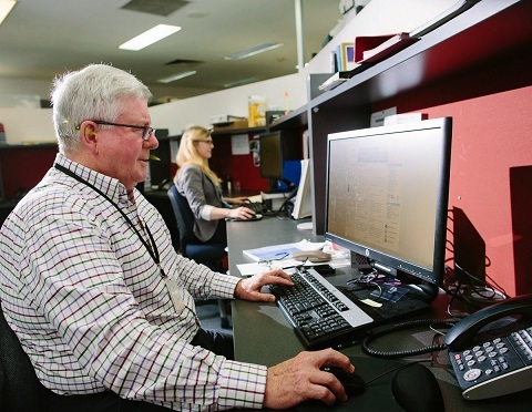 Volunteer research fellow at desk