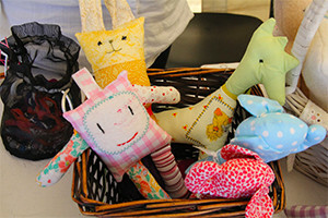 Tugu Designs toys in a basket