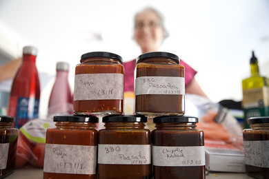 Samples of Salsita’s Authentic Traditional Mexican Salsas on a market stall