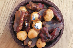 Top view of Lilly cake covered in caramelised nuts