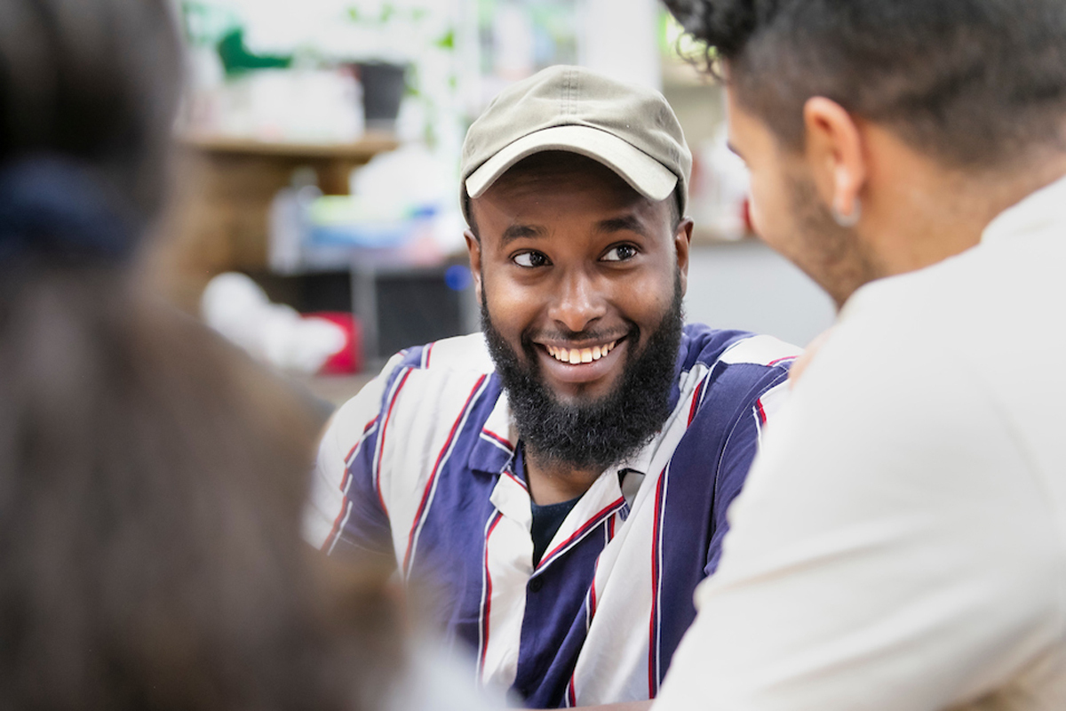 Young refugees get help to participate in the community through work, education and sport.